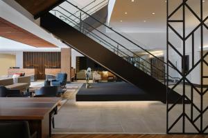 a staircase in the lobby of a building at Sheraton Denver West Hotel in Lakewood