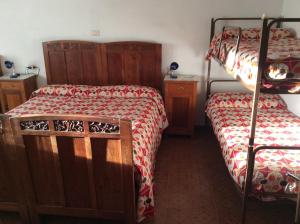 Кровать или кровати в номере Albergo Cervo