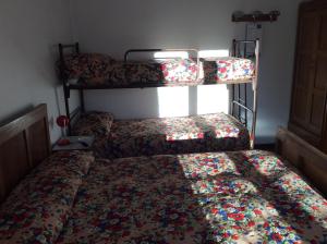 Voodi või voodid majutusasutuse Albergo Cervo toas