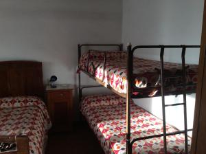 Voodi või voodid majutusasutuse Albergo Cervo toas