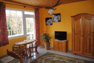 A television and/or entertainment centre at Villa Hedi