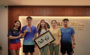a group of people standing in front of a door at Hotel Golden Joy Stay in Hai Phong