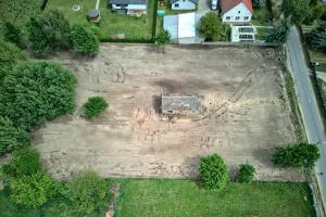 an aerial view of a large yard with a tractor at Gortatowo Natura 2000 in Gortatowo +6 photos
