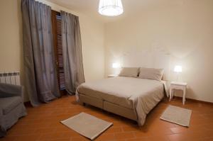 Postel nebo postele na pokoji v ubytování Il Borgo di San Gervasio