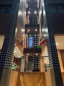 a view of a building with a spiral staircase at Hakon Canggu Boutique Hostel in Canggu