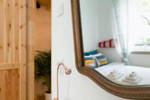 Łóżko lub łóżka w pokoju w obiekcie WSTApartments RetroFunky