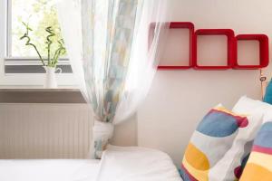 Łóżko lub łóżka w pokoju w obiekcie WSTApartments RetroFunky