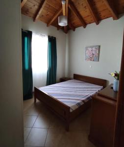 a bedroom with a bed in a room at Zarakas home in Monemvasia