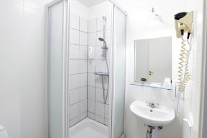 Koupelna v ubytování Fosshotel Baron