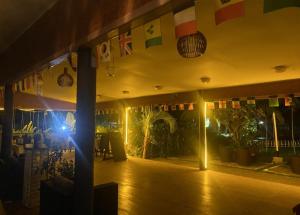 a room with flags on the wall of a building at Nadi Fancy Hotel in Nadi +161 photos