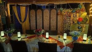 a table set up for a party with balloons and candles at Nadi Fancy Hotel in Nadi +126 photos