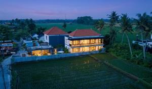 an aerial view of a house with lights at Bale Sidi House Ubud in Ubud