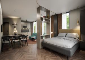 a bedroom with a bed and a dining room at Apartmenthaus Berlin Mitte in Berlin