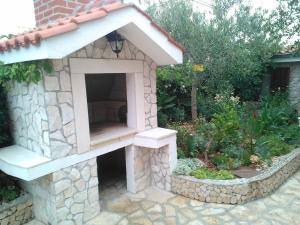 Vonkajšia záhrada v ubytovaní Tone & Marta Apartments