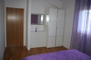 Posteľ alebo postele v izbe v ubytovaní Tone & Marta Apartments
