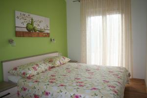 Posteľ alebo postele v izbe v ubytovaní Tone & Marta Apartments