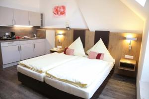 
Ein Bett oder Betten in einem Zimmer der Unterkunft Wasmayr Hof
