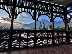 a view from a building with a view of mountains at Stay O'clock Hotel Skardu in Skardu