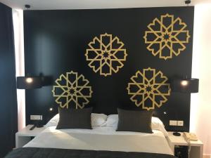 Posteľ alebo postele v izbe v ubytovaní Hotel Comfort Dauro 2