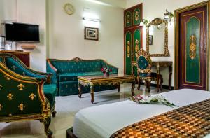 TV a/nebo společenská místnost v ubytování Hotel Sunstar Residency