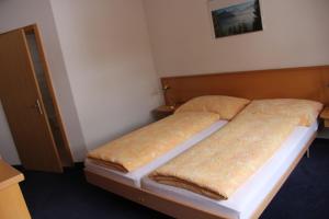 Letto o letti in una camera di Hotel Eigerblick