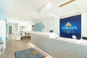 a salon with a blue sign on a counter at Saraya Resort in Alinda +92 photos