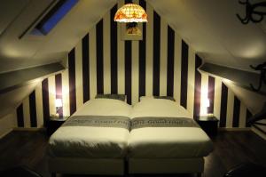 เตียงในห้องที่ Herkenhoek 3 bedroom apartement