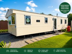 a tiny house is parked in a yard at Elite Retreat Caravan in Blackpool
