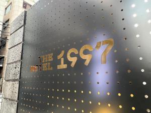 a building with the sign on it at The hotel 1997 - 더호텔 1997 in Seoul