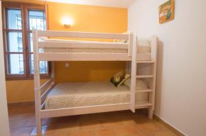 Postel nebo postele na pokoji v ubytování Casa Rural El Riberer