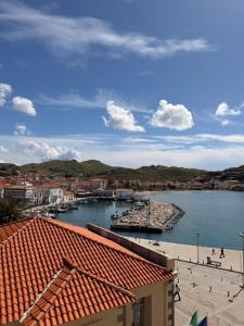 a view of a body of water with a marina at Hotel Lemnos in Myrina