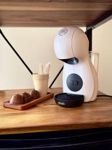 a coffee maker sitting on top of a counter at Boutique Palacio in Alicante