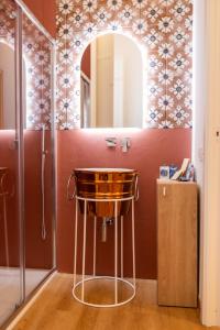 a bathroom with a sink and a mirror at Lina's Room in Cinisi +29 photos