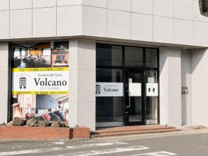a building with a vocalonia sign in the window at Volcano in Kagoshima