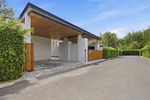 an image of a house with a driveway at Botanica Foresta Luxury Villa Phuket in Phuket