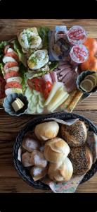 two plates of food with different types of food at Kominkowy Chill - Jacuzzi, Sauny & Wybrane apartamenty z prywatnym jacuzzi in Zakopane +136 photos