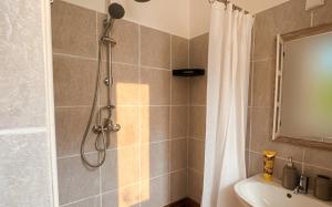 a bathroom with a shower and a sink at Mekcsey Udvar in Eger +30 photos