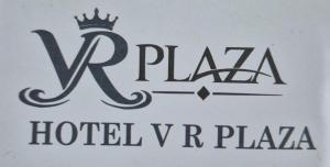 a sign for a hotel vazil v hotel plaza at Hotel VR Plaza in Etah