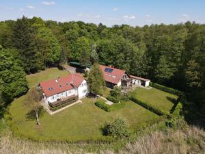 an aerial view of a large house with a yard at Forsthaus Boberow in Rheinsberg