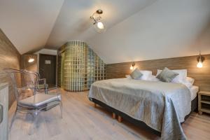 Postel nebo postele na pokoji v ubytování Amenity Hotel & Resort Špindlerův Mlýn