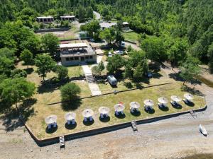 an aerial view of a park with umbrellas at Tent for 2 in Brungaj