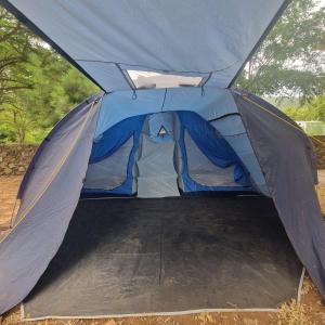 a blue and gray tent with the door open at Tent for 2 in Brungaj