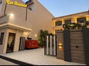 a house with a gate in front of it at Ram Anandam inn in Ayodhya
