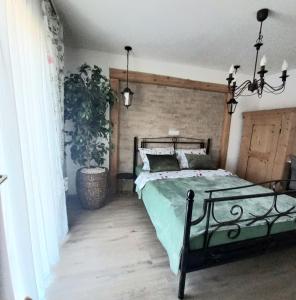 a bedroom with a large bed in a room at Apartmani Lea in Bribir +32 photos