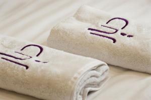two white towels with two hearts written on them at Ya Bayté in Beirut +50 photos