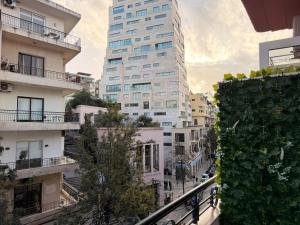 a view of a city with tall buildings at Ya Bayté in Beirut