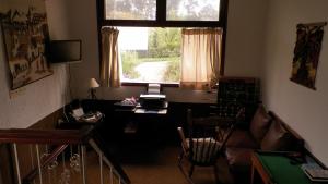 TV a/nebo společenská místnost v ubytování Casa Brujas Pinares