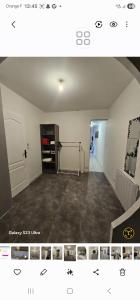 an empty living room with a room with a door at Sophie Appartement in Villeneuve-sur-Lot