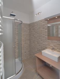 Kylpyhuone majoituspaikassa La Siesta Bogács Apartman