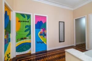 a room with colorful murals on the walls at Maroca RIO in Rio de Janeiro +60 photos
